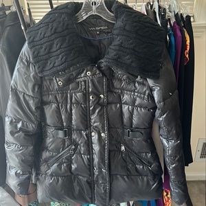 Super cute. Tons of detail. Medium warmth. Light puffer